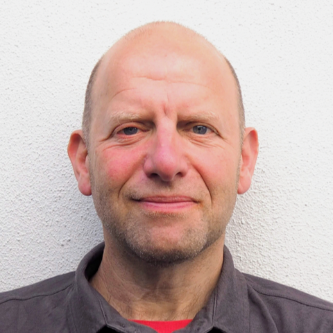 A headshot of Dan Phillips